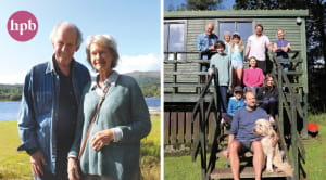 Older couple and family sat on steps